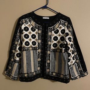 Beaded jacket without closures.